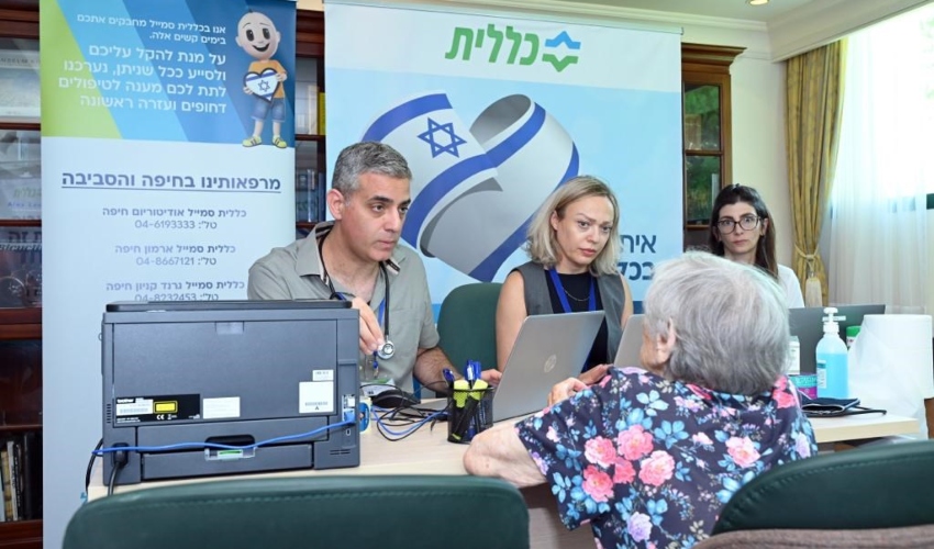 ד"ר דני קירשנר, מאיה לויצקי ועו"ס רוני גורל במרפאת המפונים במלון יערות הכרמל (צילום: רפי זוהר)